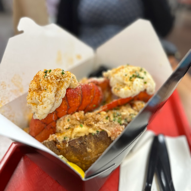 Lobster sensation, glossy lobster pieces dressed and ready to top a Rock N' Potato build